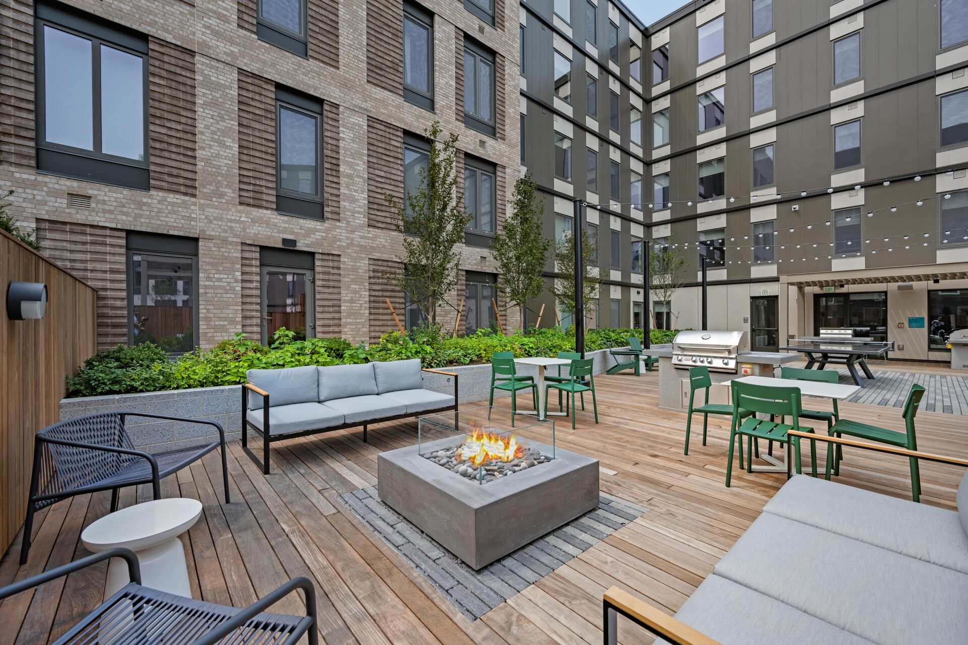 Community courtyard firepit for cozy gatherings.