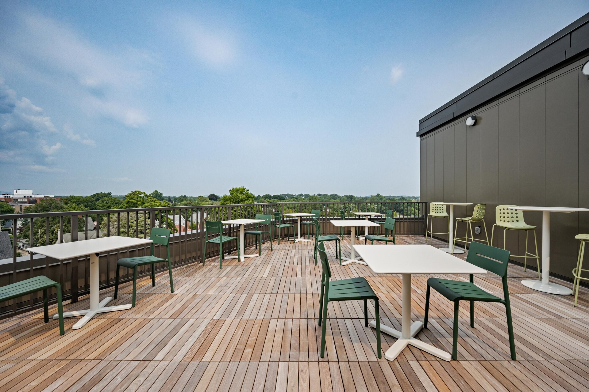 Stylish rooftop deck seating with expansive views.