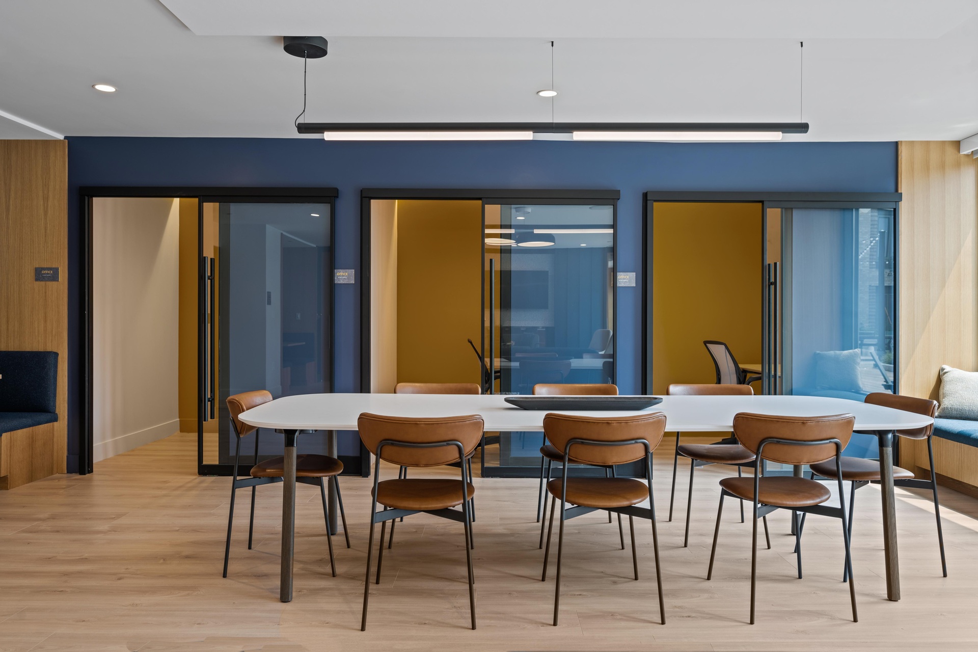 Lounge with work pods and communal table.